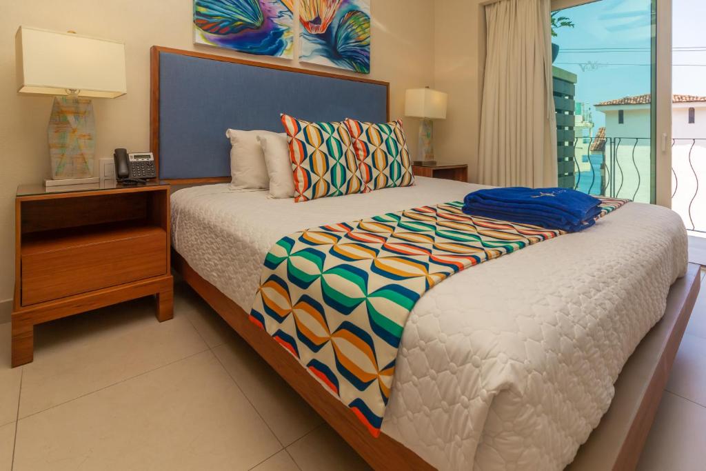 Postel nebo postele na pokoji v ubytování V Azul Vallarta - Luxury Vacation Rental Adults Only