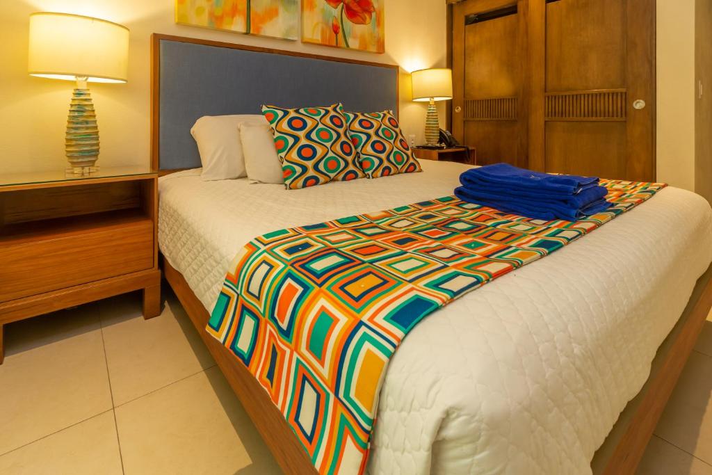 Postel nebo postele na pokoji v ubytování V Azul Vallarta - Luxury Vacation Rental Adults Only