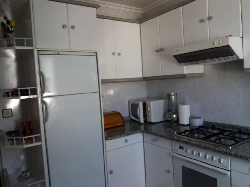 Kuchyň nebo kuchyňský kout v ubytování Casa Cristina