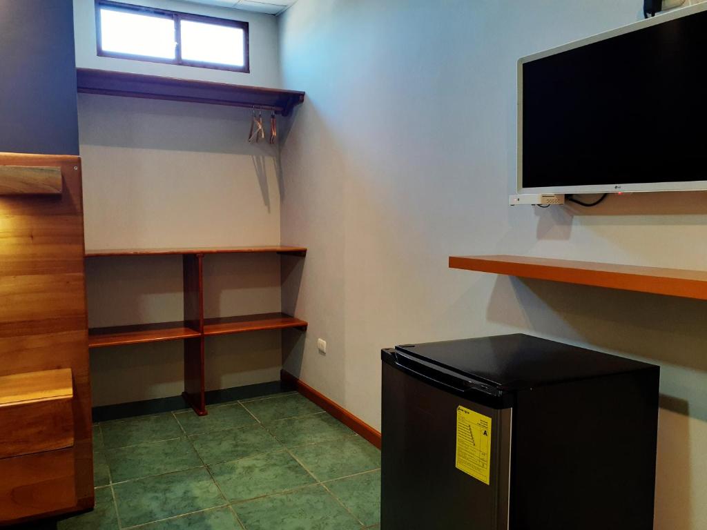 TV a/nebo společenská místnost v ubytování Casa D´Cristhi