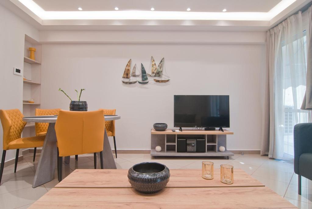 Televízia a/alebo spoločenská miestnosť v ubytovaní Home pleasure project
