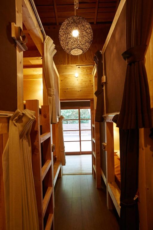 Postel nebo postele na pokoji v ubytování Guest House Preta Torami