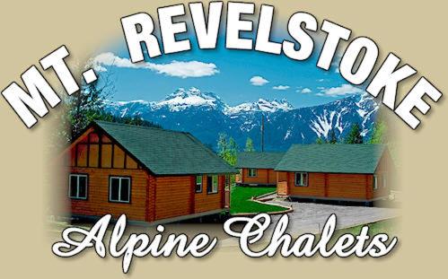 a picture of a house with mountains in the background at Mt. Revelstoke Alpine Chalets in Revelstoke