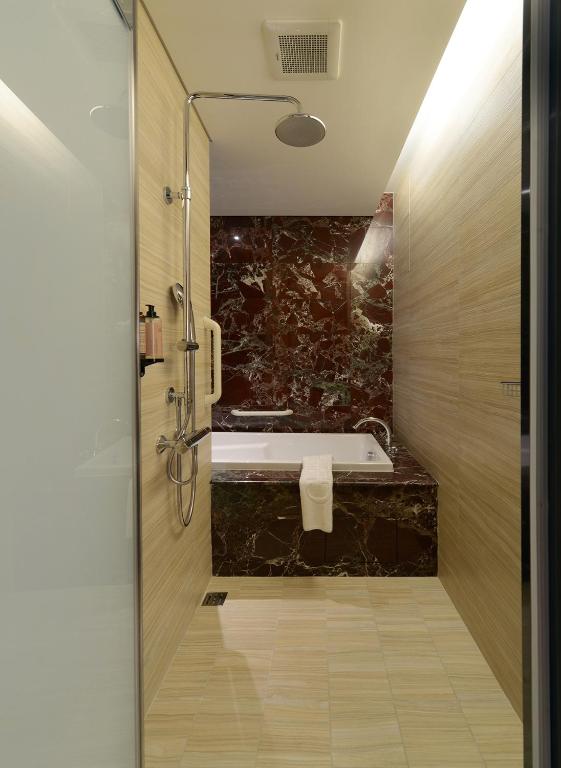 Koupelna v ubytování Golden Tulip RS Boutique Hotel-Tainan