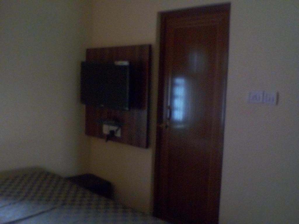 TV a/nebo společenská místnost v ubytování Om Sai Villa Guesthouse