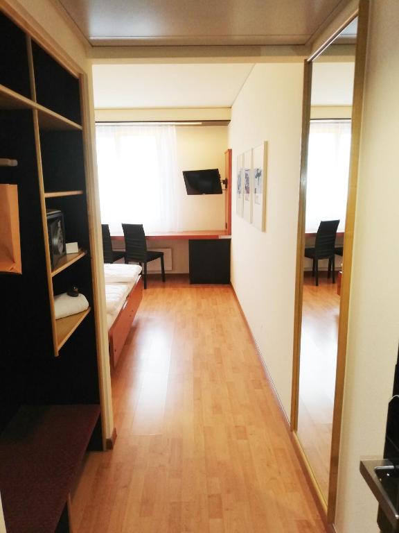 TV a/nebo společenská místnost v ubytování Hotel Arte Spreitenbach