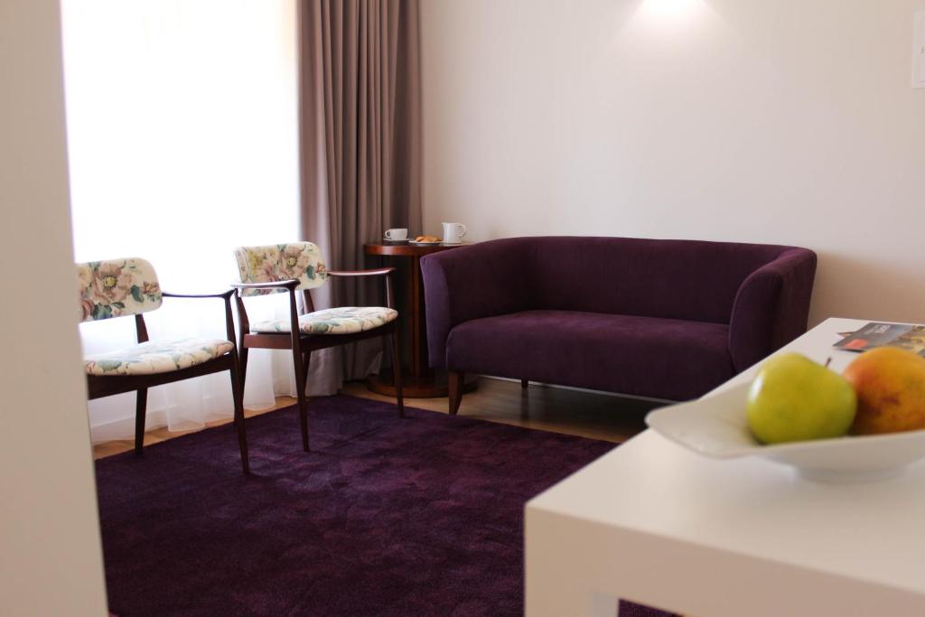 Uma rea de estar em Convento Da Serta Hotel