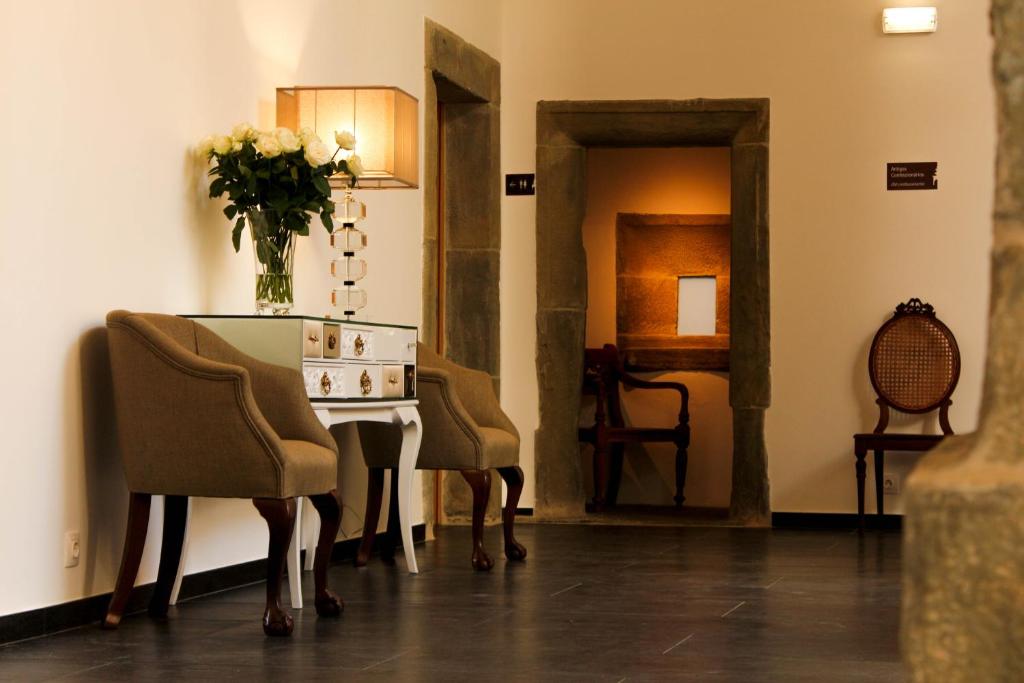 Uma rea de estar em Convento Da Serta Hotel
