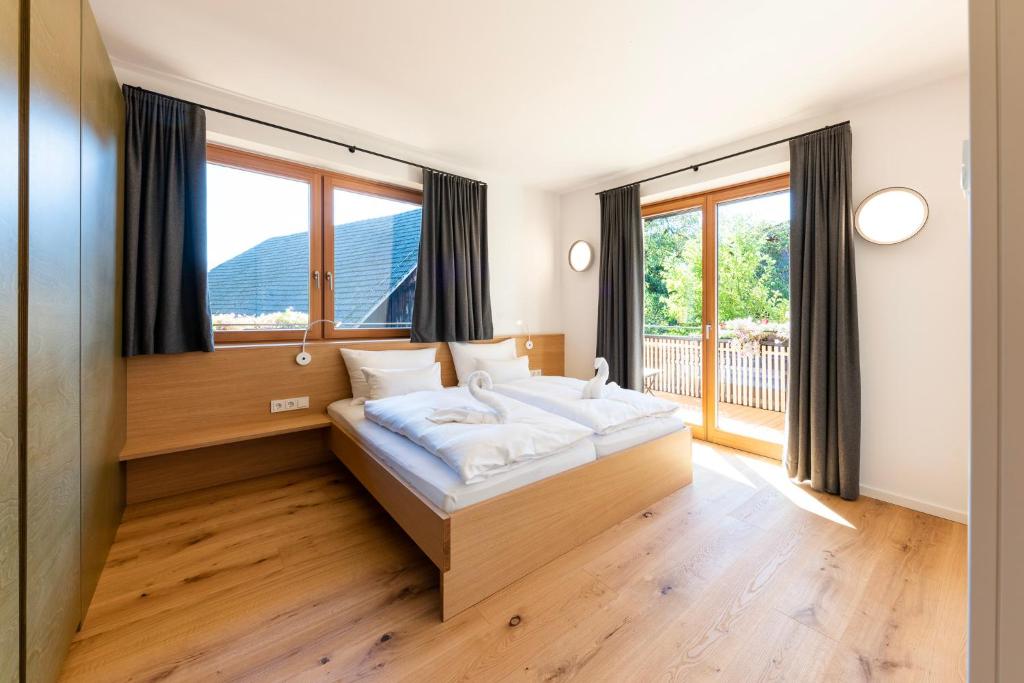 Posteľ alebo postele v izbe v ubytovaní Kuglerhof Appartements