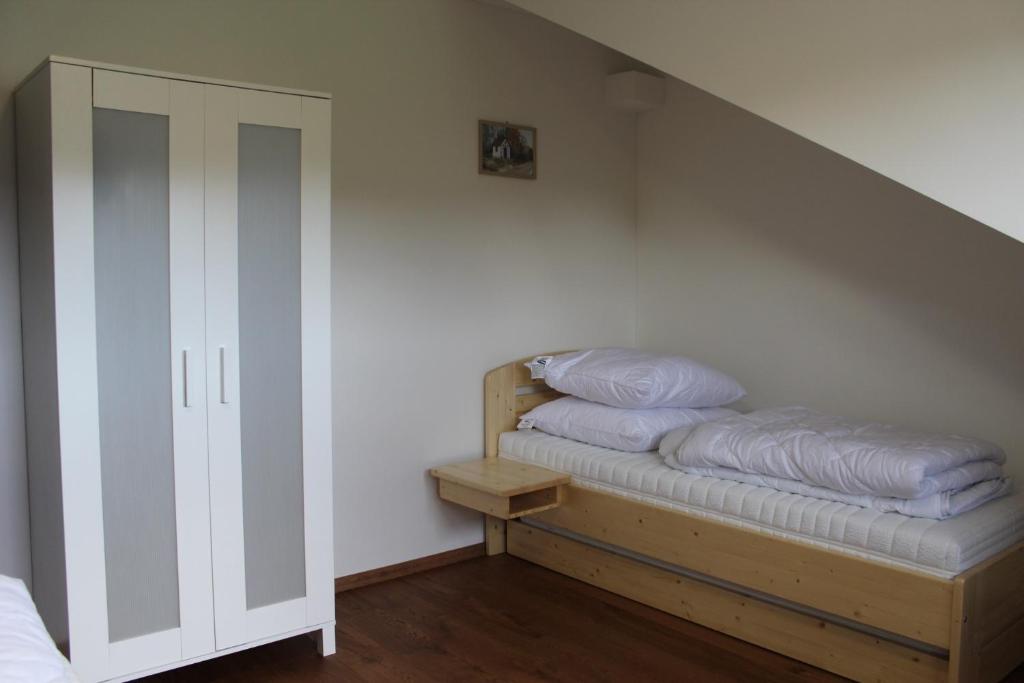 Postel nebo postele na pokoji v ubytování Apartmán Pivoňka
