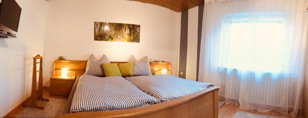 Postel nebo postele na pokoji v ubytování Ferienwohnung zum Nationalpark