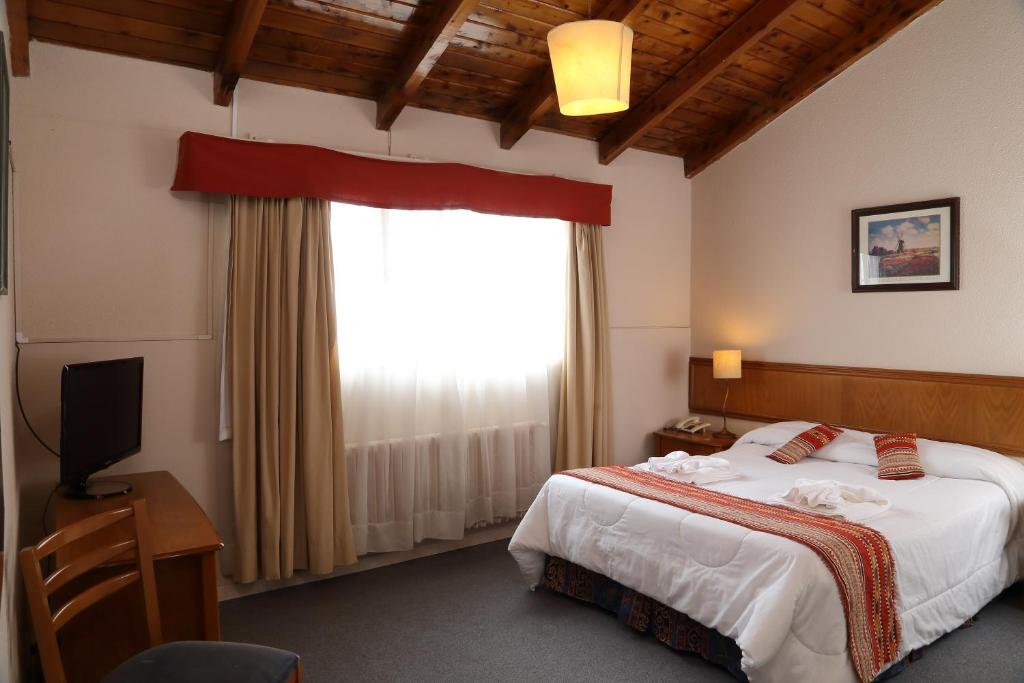 Postel nebo postele na pokoji v ubytování Hotel Cottbus