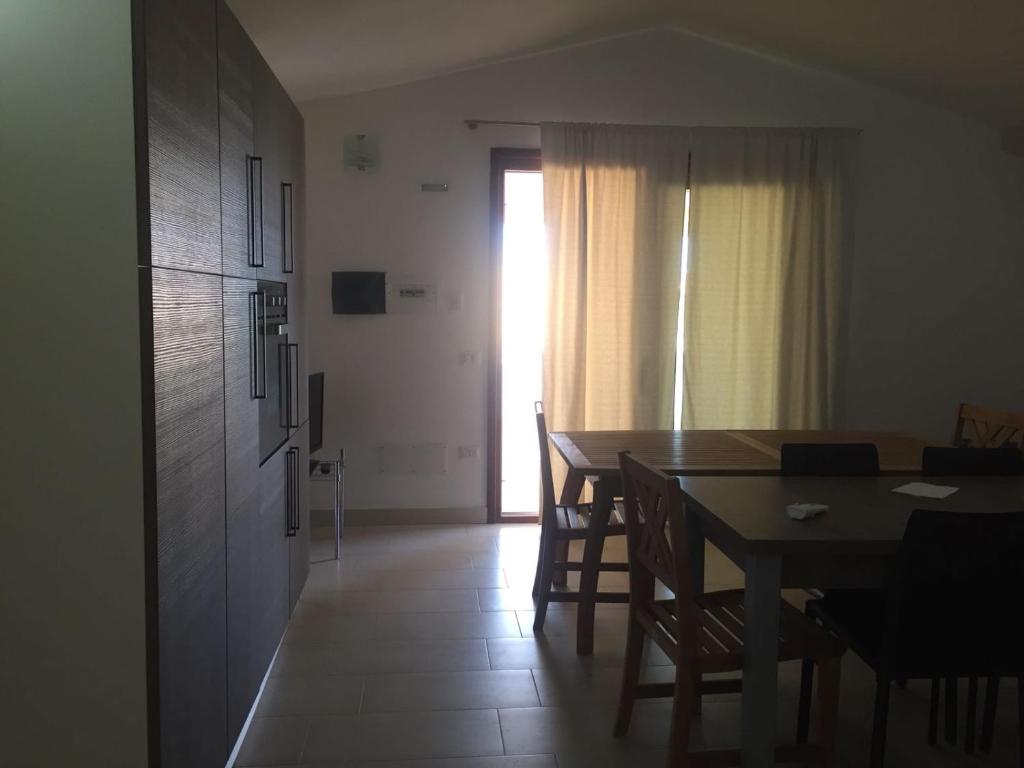 Zdjęcie z galerii obiektu villetta con terrazza w mieście Posada