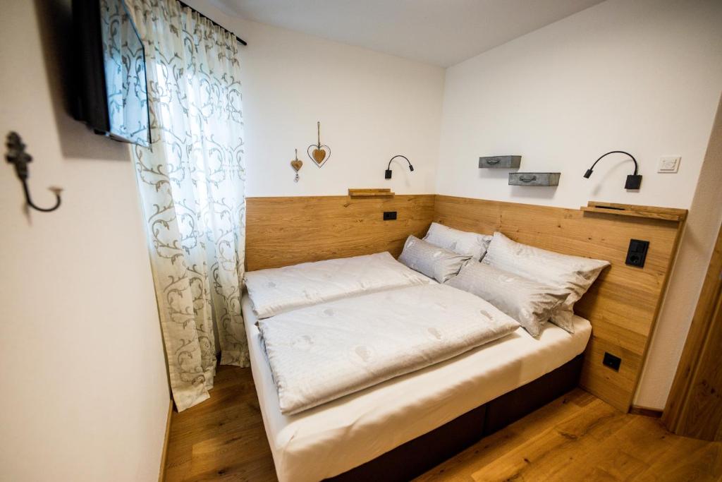 Postel nebo postele na pokoji v ubytování Leni´s Appartements