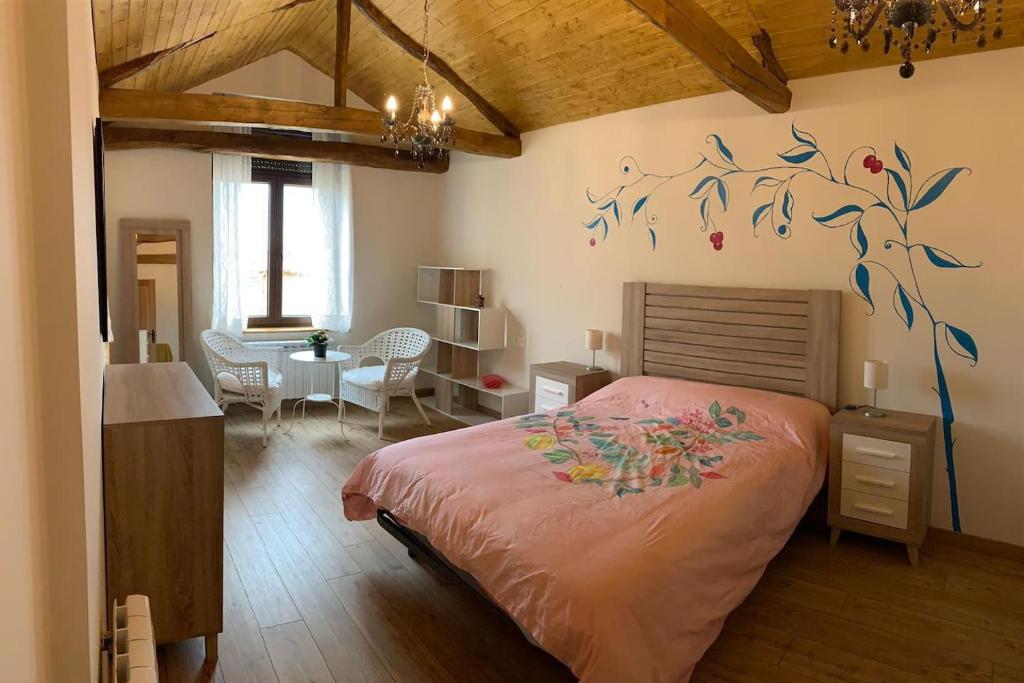 En eller flere senger på et rom på El pajar de Miro