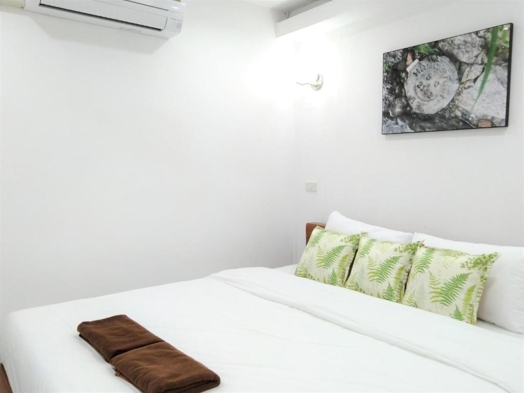 Postel nebo postele na pokoji v ubytování WEE HOSTEL