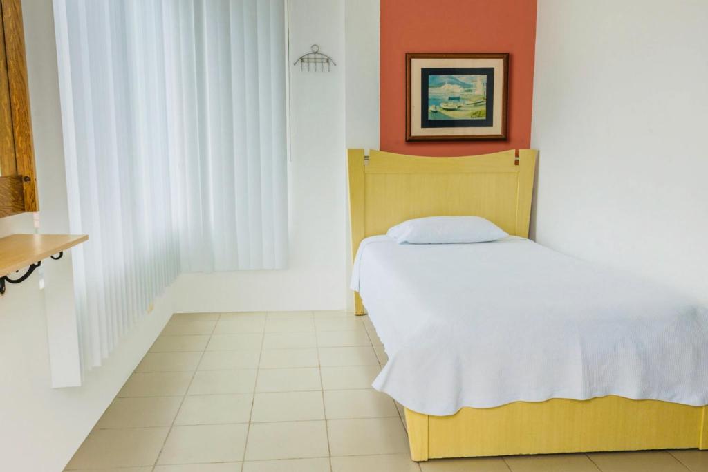 Postel nebo postele na pokoji v ubytování Oceanic Lodge