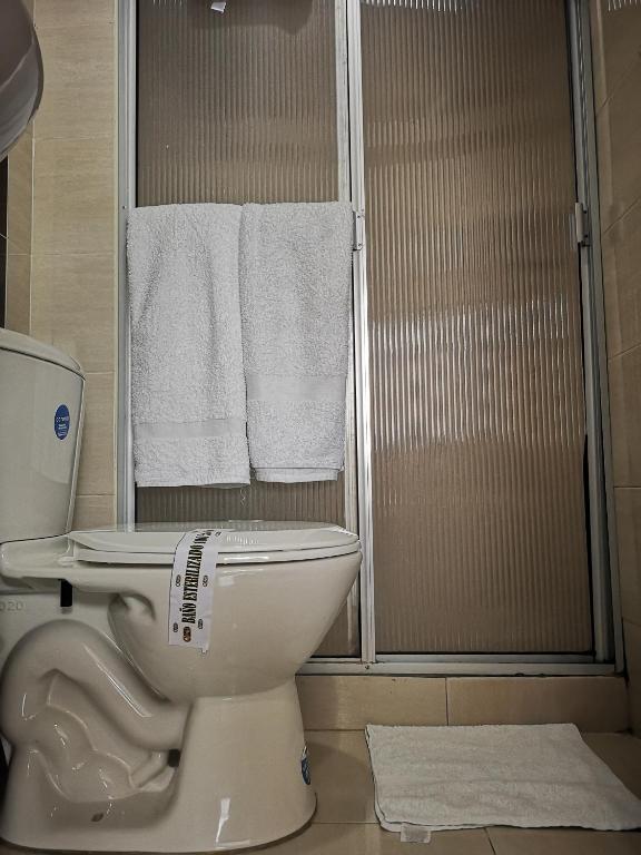 Koupelna v ubytování Hotel Royal Suite