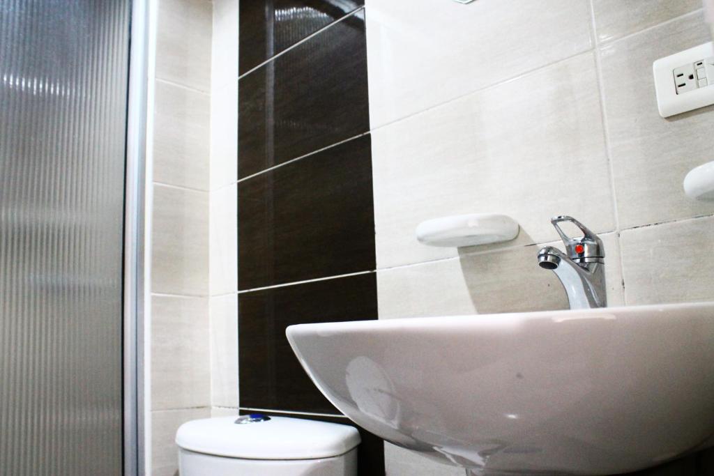 Koupelna v ubytování Hotel Royal Suite