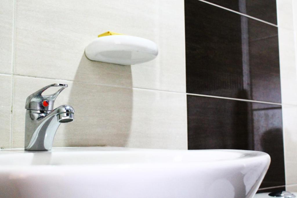 Koupelna v ubytování Hotel Royal Suite