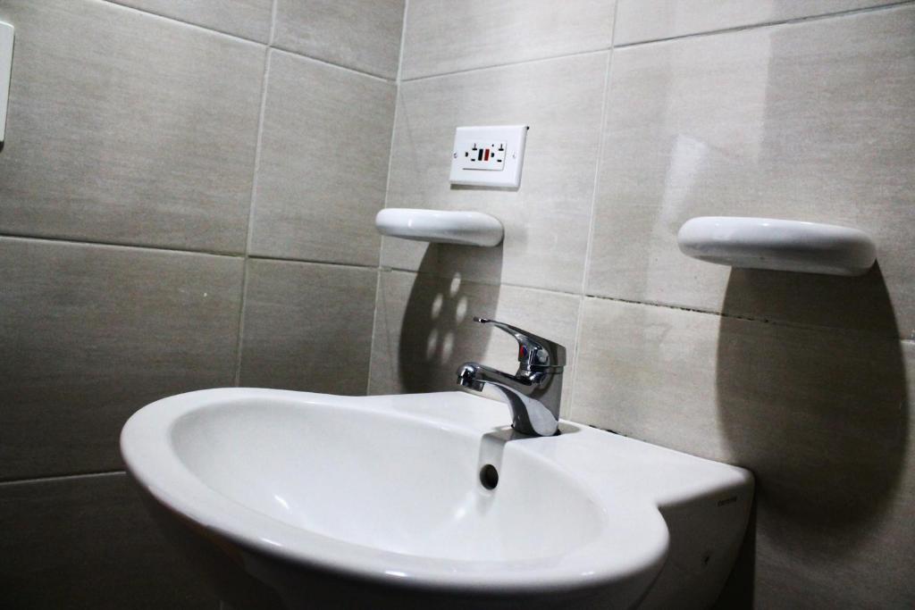 Koupelna v ubytování Hotel Royal Suite