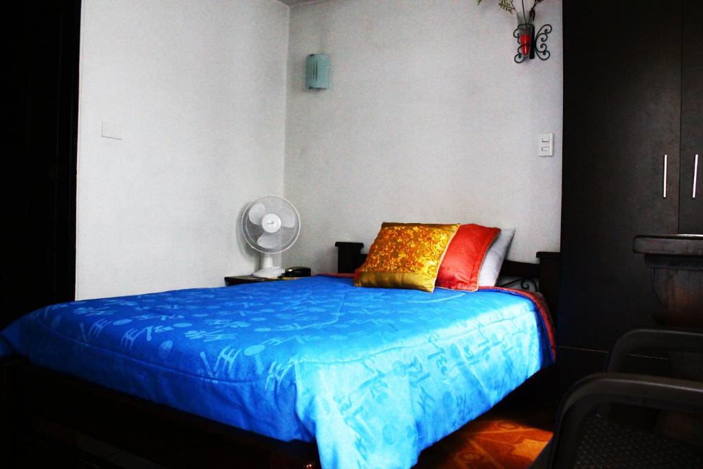 Postel nebo postele na pokoji v ubytování Hotel Royal Suite