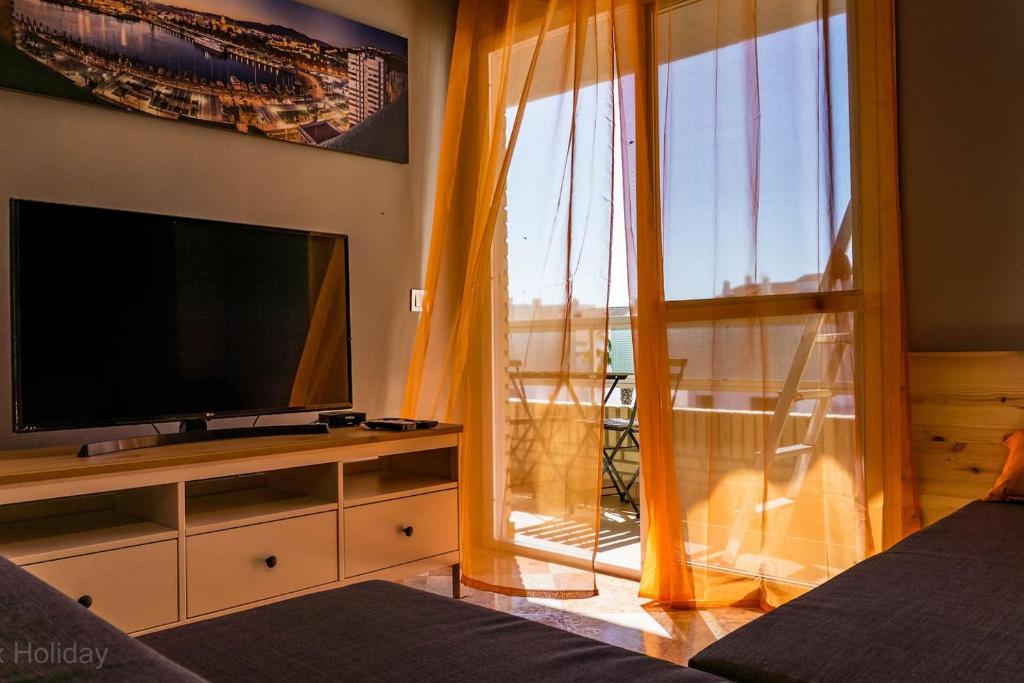 Telewizja i/lub zestaw kina domowego w obiekcie Timax Home Costa del Sol