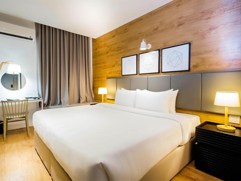 Postel nebo postele na pokoji v ubytování Avior Hotel