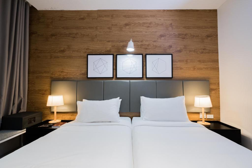 Postel nebo postele na pokoji v ubytování Avior Hotel