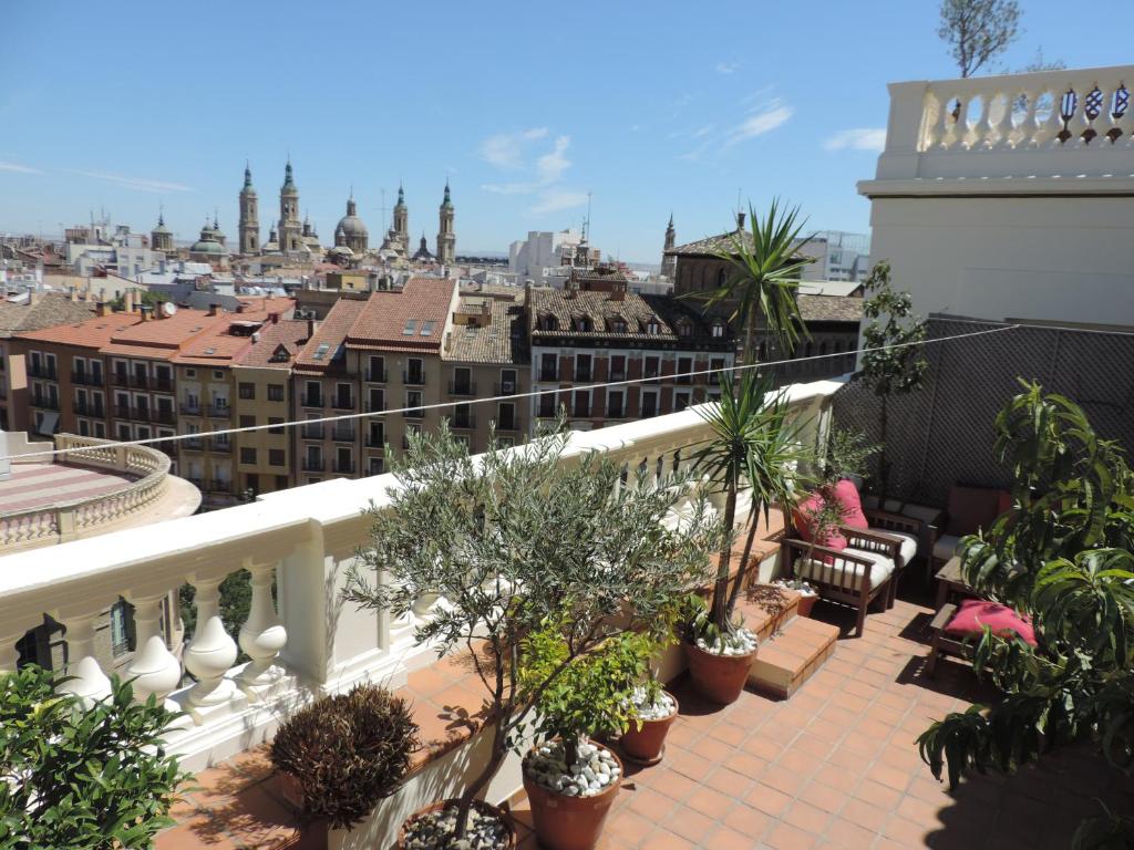 a balcony with a view of a city at La Balaustrada, con parking incluido in Zaragoza