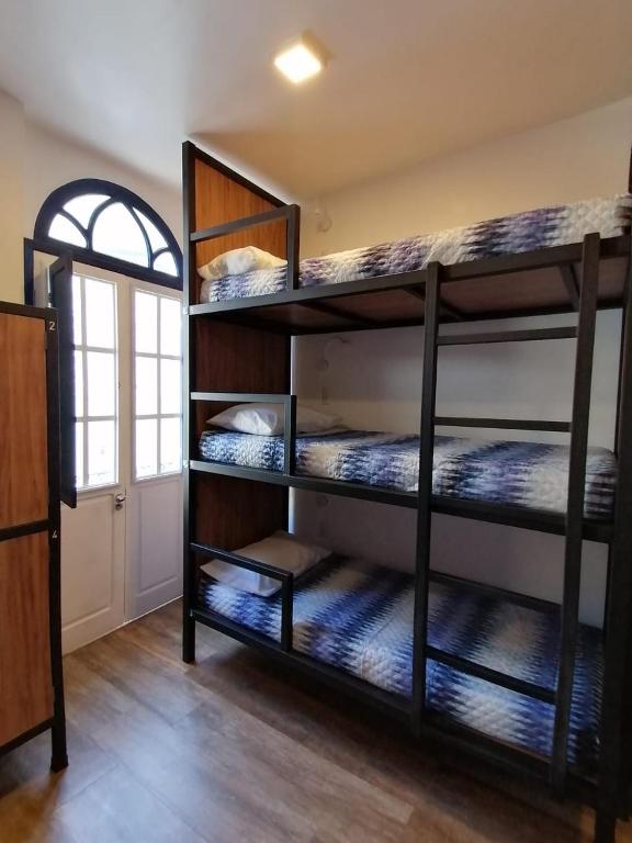 Postel nebo postele na pokoji v ubytování Bahia Pelô Hostel