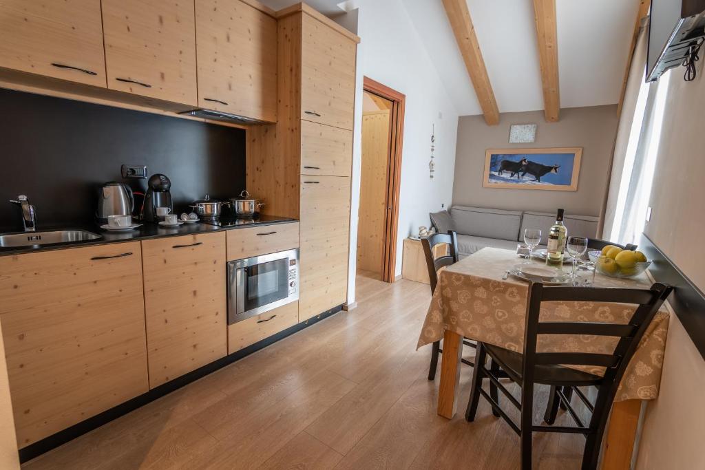 Kuchyň nebo kuchyňský kout v ubytování Aparthotel Dolomites Living&Relax