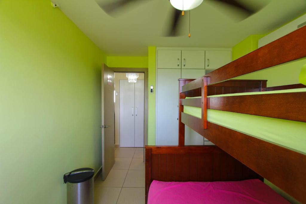 Postel nebo postele na pokoji v ubytování 2201 Playa EL Palmar