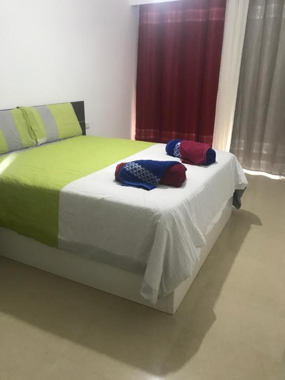 Postel nebo postele na pokoji v ubytování Dar Hachemia