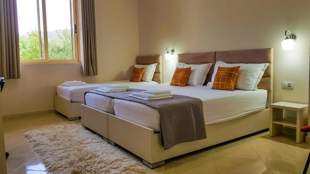 Llit o llits en una habitació de Olive B&B