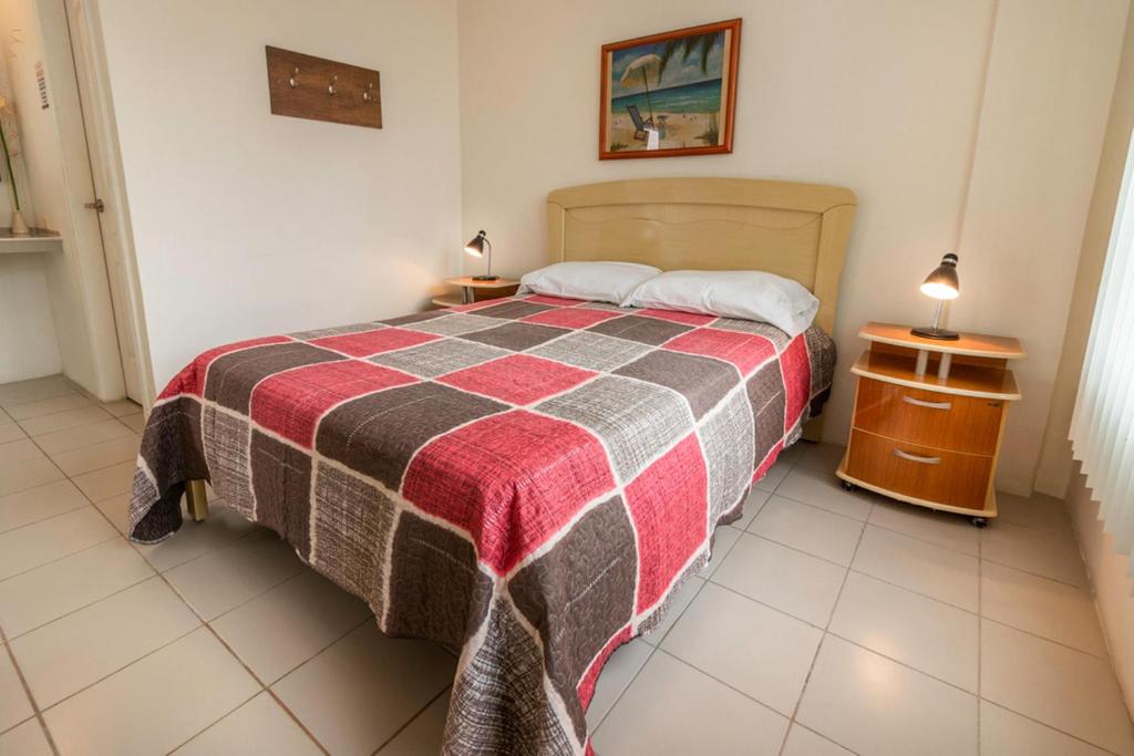 Postel nebo postele na pokoji v ubytování Oceanic Lodge