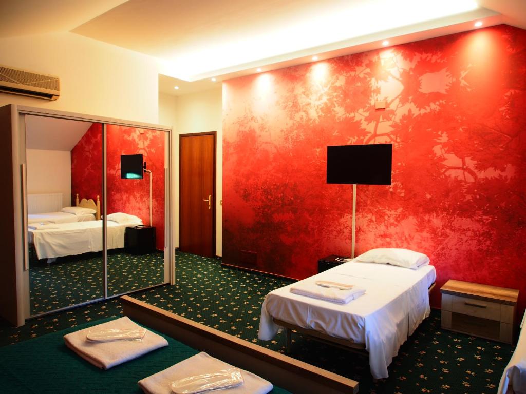Posteľ alebo postele v izbe v ubytovaní Hotel Parco Fola