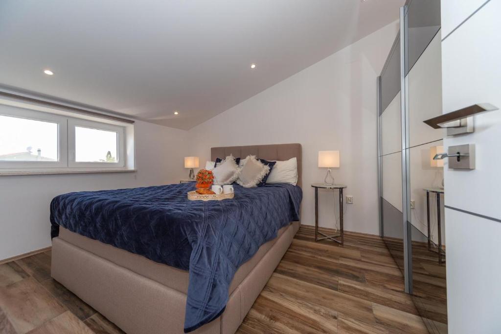 Postel nebo postele na pokoji v ubytování Apartment Antonio