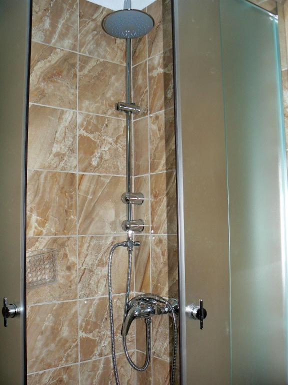 A bathroom at Alpha Omega (AΩ) Vintage Suite