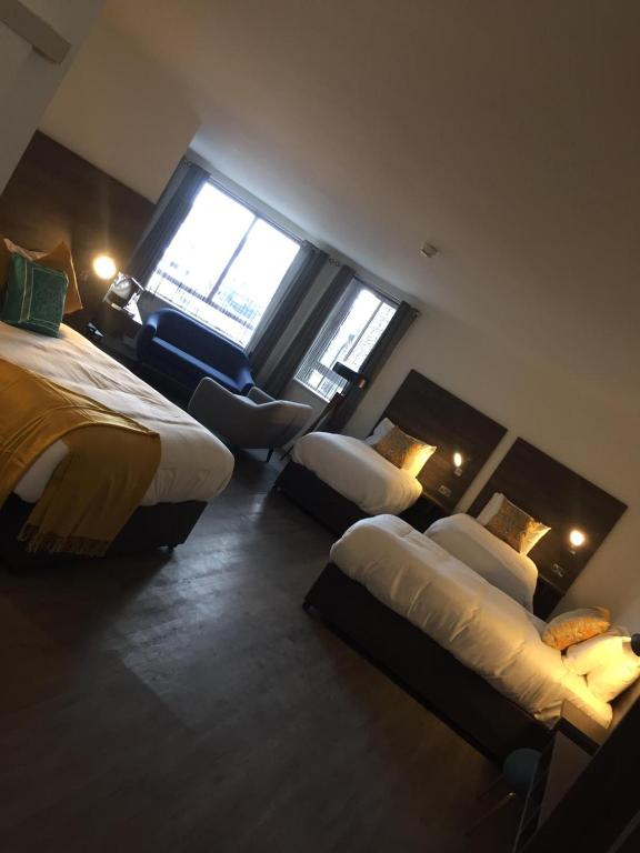 Uma cama ou camas num quarto em Base Dingle