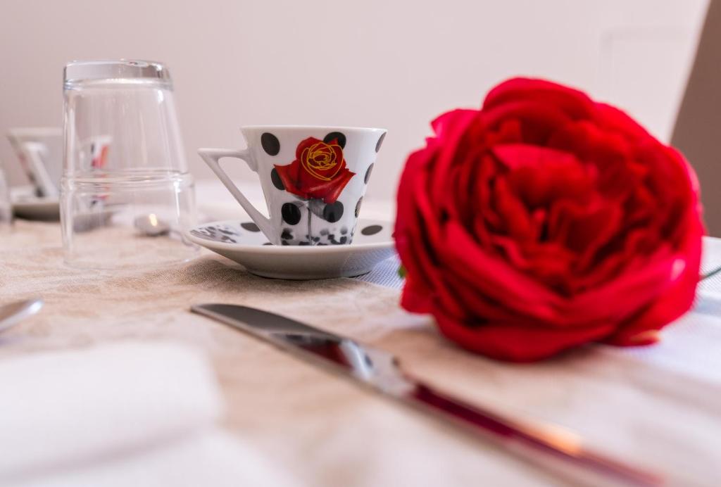 Nápoje v ubytovaní Le Undici Rose Hotel