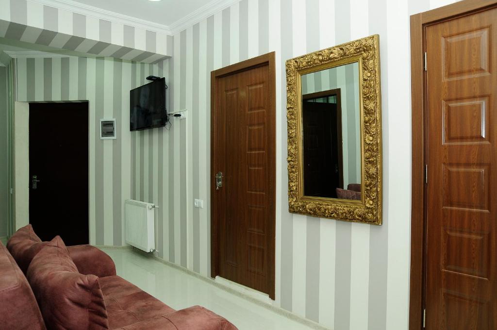 TV a/nebo společenská místnost v ubytování Family Hotel Chino