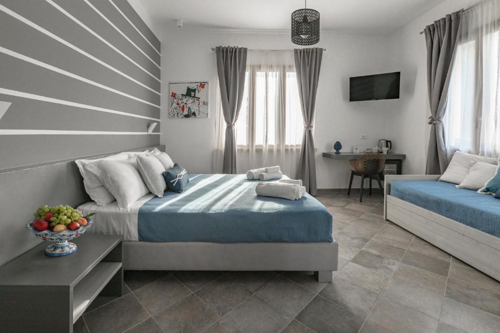 Postel nebo postele na pokoji v ubytování B&B Dimora dei Templi