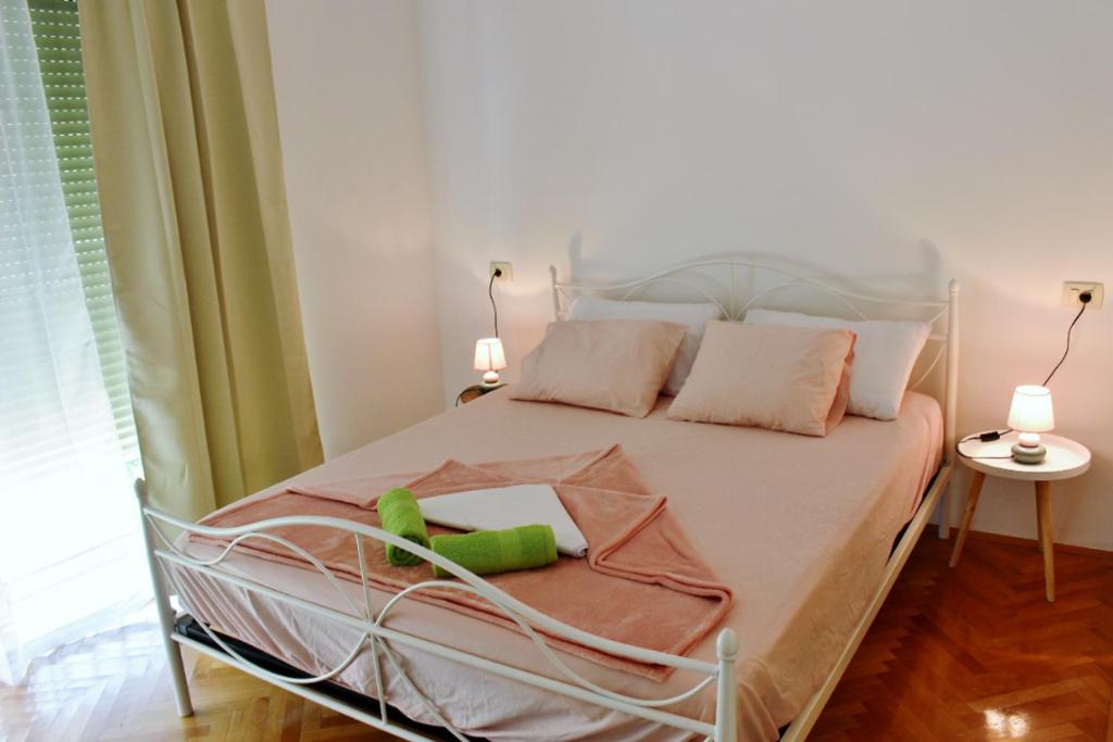 Postel nebo postele na pokoji v ubytování Rooms Marana