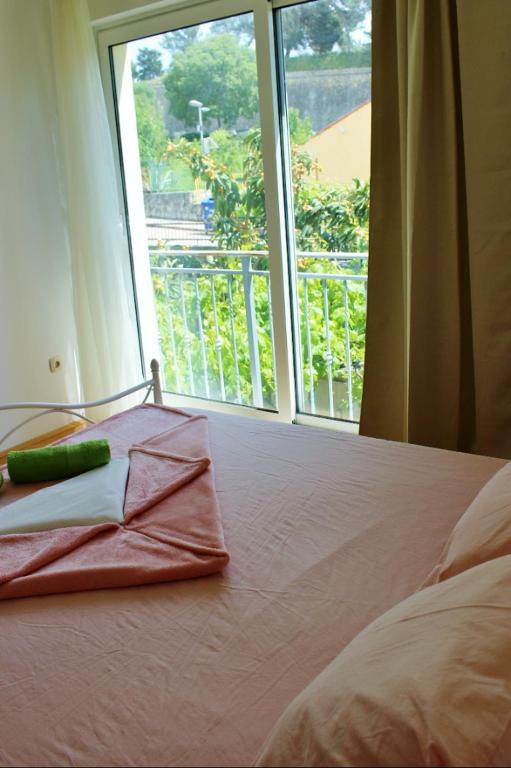 Postel nebo postele na pokoji v ubytování Rooms Marana