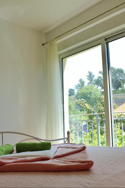 Postel nebo postele na pokoji v ubytování Rooms Marana