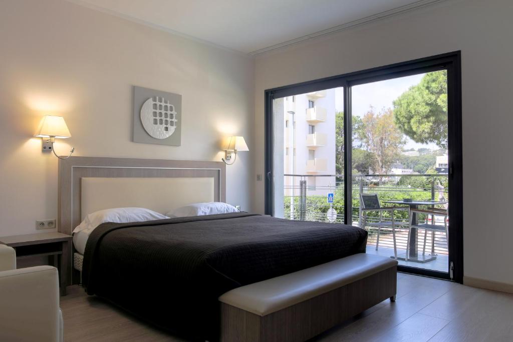 Кровать или кровати в номере Villa Azur