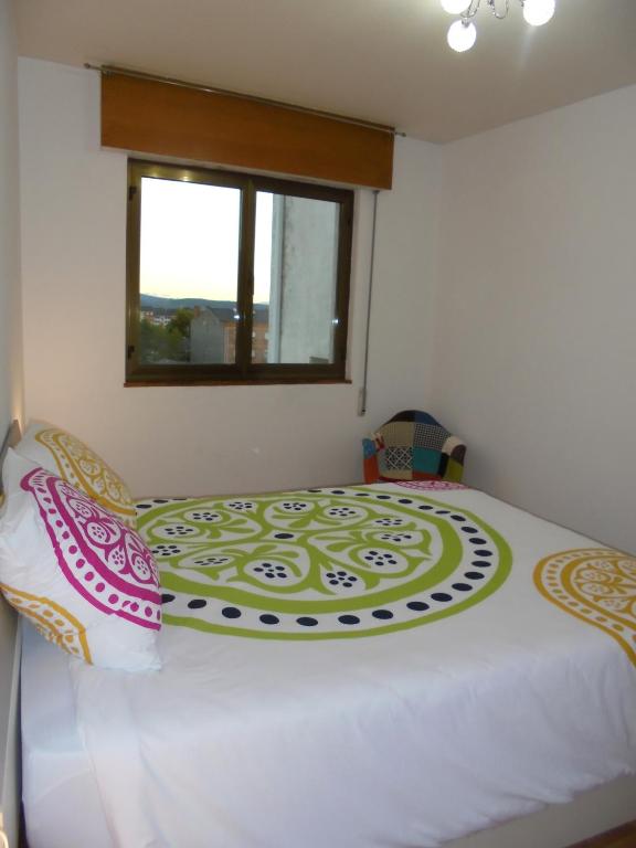 Posteľ alebo postele v izbe v ubytovaní Jaen Apartment