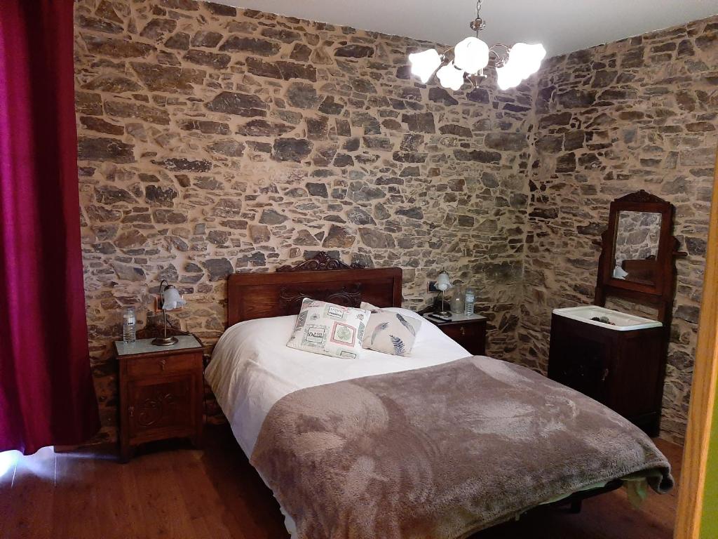 Posteľ alebo postele v izbe v ubytovaní A Casa do Ferrador
