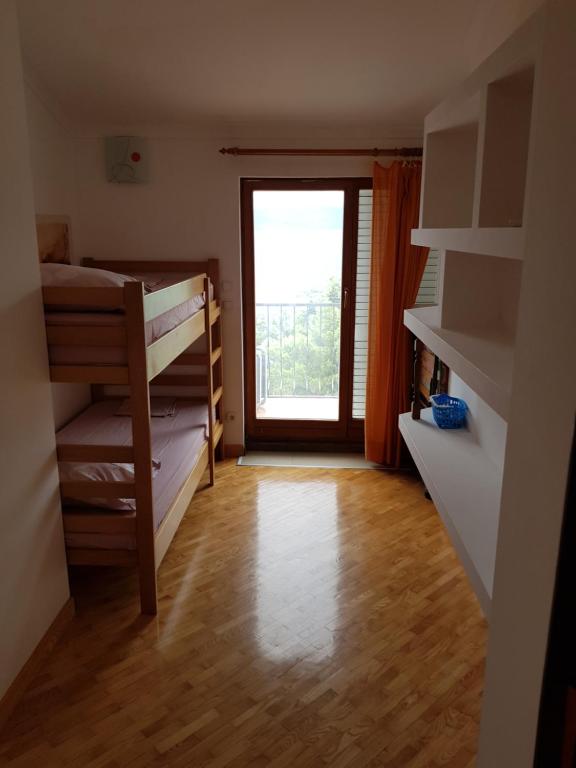 Postel nebo postele na pokoji v ubytování Apartman Ivan